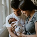 parents-and-newborn-conflict